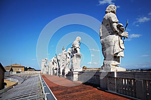 Apostles statues on the roof of St Peter`s Basilica in Vatican city, Rome, Italy