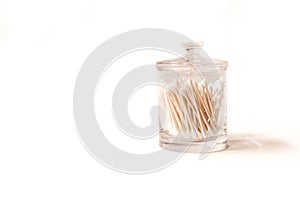 Apothecary jar of cotton swabs