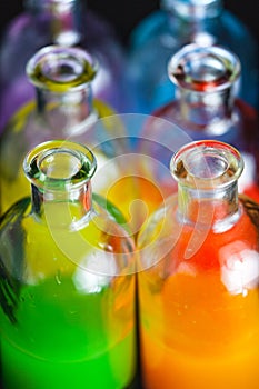 Apothecary, laboratory bottles with colored liquid