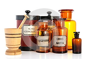 Apothecary pots with ingredients for medicins photo