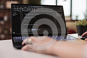 App developer using terminal window with code