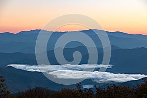 Appalachian mountains with lake and clouds in valley