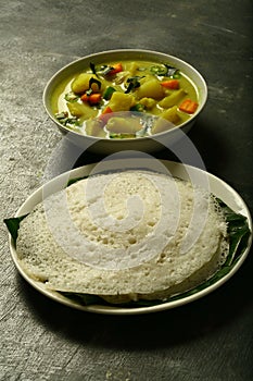 Appam with vegetable stew -Indian recipes.