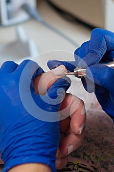 Apparatus beautiful manicure for woman, nails hands close-up. Concept spa services of beauty salons