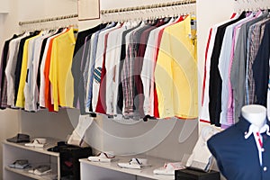 Apparel store with men shirts on hangers