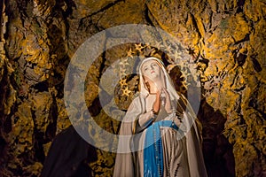 Apparition of the Blessed Virgin Mary in the grotto of Lourdes photo