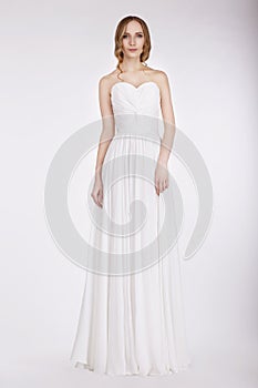 Appealing Young Bride in Wedding Dress photo