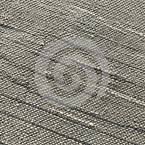 Appears coarse and slightly uneven typical of hand loomed or rustic