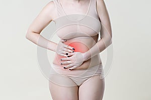 Appendicitis attack, woman with abdominal pain