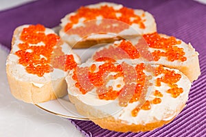 Appetizer of Caviar on Slices of Baguette Bread