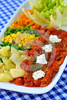 Appetizer, colorful fresh salads with ajvar