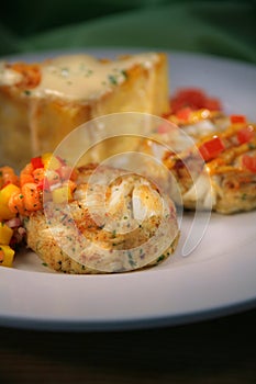 Appetizer with Crab Cakes, Cream Sauce, Cheese