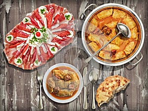 Appetizer Dish Served with Domestic Pickled Cabbage Rolls and Leavened Flatbread on Vignette Old Weathered Picnic Table