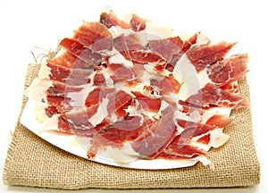 Appetizer of ham thinly sliced