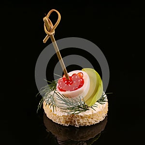 Appetizer isolated on black background.