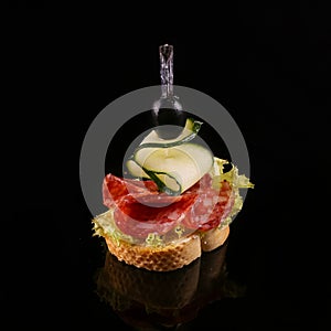 Appetizer isolated on black background.