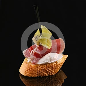 Appetizer isolated on black background.