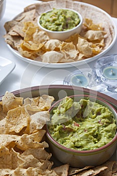 Appetizer Mexican tacos (mais tortillas) with guacamole