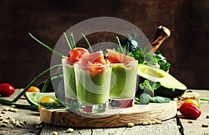 Appetizer with smoked salmon and avocado mousse, served in glass