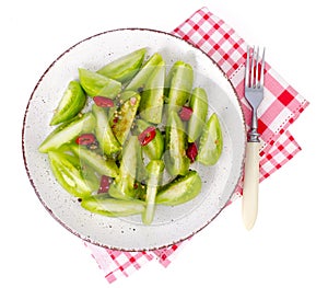 Appetizer of spicy pickled green tomatoes