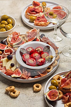 Appetizers, antipasti, snacks and vermouth cocktail. Bruschetta, cold cuts