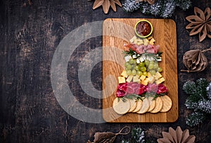 Appetizers plate in shape of Christmas tree.