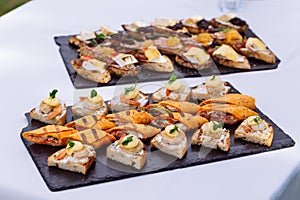 Appetizers served at wedding, tasty amuse-bouche photo