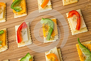 Appetizers or snacks on saltine crackers