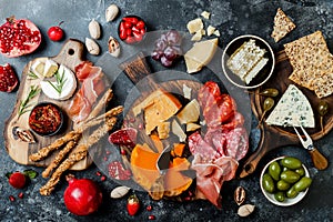 Appetizers table with italian antipasti snacks. Brushetta or authentic traditional spanish tapas set, cheese variety board photo