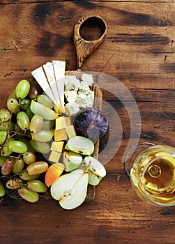 Appetizers table wine Fruit cheese wooden board