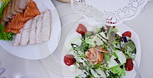 Appetizers. Various types of cheese, salami and prosciutto. Decorated table, buffet