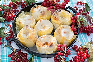 Appetizing baked apples with fresh Kalina