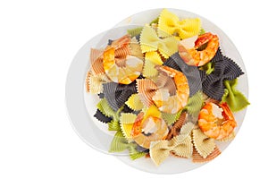 Appetizing colored farfalle pasta with chrimp photo