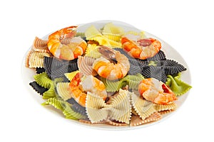 Appetizing colored farfalle pasta with chrimp photo