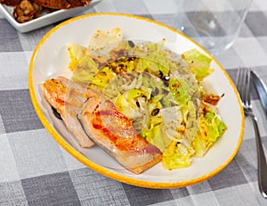 Appetizing salmon with a vegetable salad