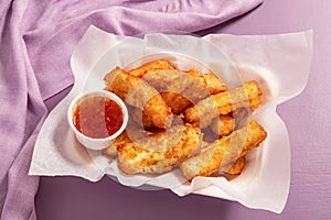 Appetizing gold fried halloumi portion with sweet chilli dip