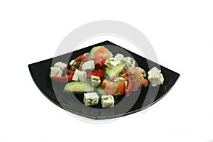 Appetizing greek salad on a plate.