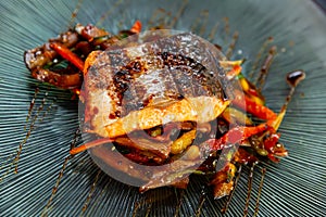 Appetizing salmon with stewed vegetables