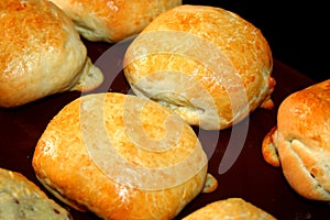 Appetizing pies with cheese.