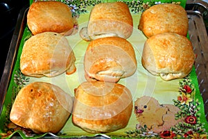 Appetizing pies with cheese.