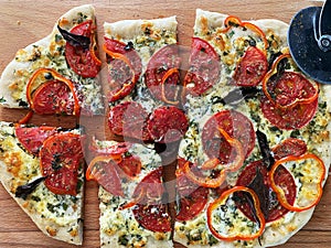 Flat bread with ricotta, tomatoes, bell peppers and herbs. Step by step. Step 2