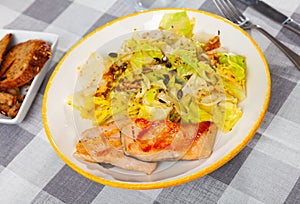 Appetizing salmon with a vegetable salad
