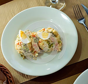 Spanish salad called Ensalada rusa photo