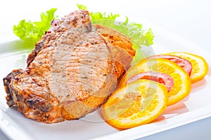 Appetizing stake with vegetables photo