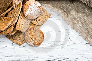 appetizing sweet homemade classical Italian crackers on light wooden background