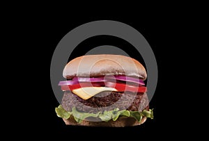 Appetizing and tasty cheeseburger with thick patty isolated