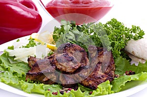 Appetizing weal kebab on skewers photo