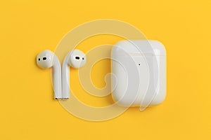 Apple AirPods - wireless bluetooth earphones or headphones and white box for storage and charging, use with Iphone, Ipad or Mac - photo