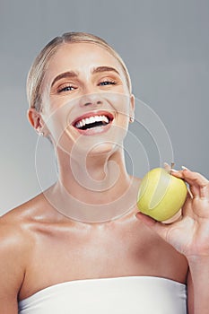 Apple, beauty and portrait of health woman with fruit for body care, antioxidants and healthy weight loss diet