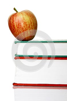 Apple with books